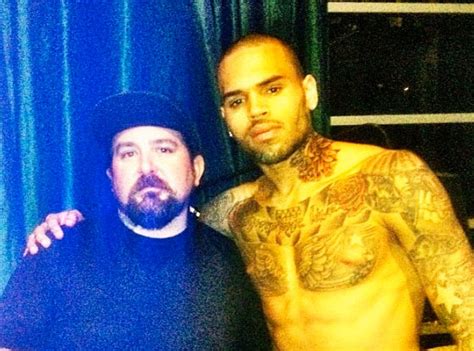 Chris Brown S Neck Tattoo Artist I Would Never Promote Domestic Violence E News