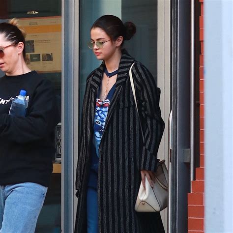 Selena Gomez Takes Her Statement Coat Cues From The Weeknd Vogue
