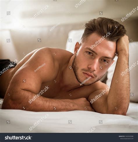 Shirtless Sexy Male Model Lying Alone Stock Photo 1920920588 Shutterstock