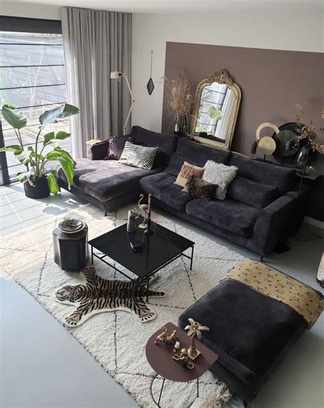Bank für arbeit und wirtschaft. black, velvet sofa surrounded with beautiful fabrics and ...