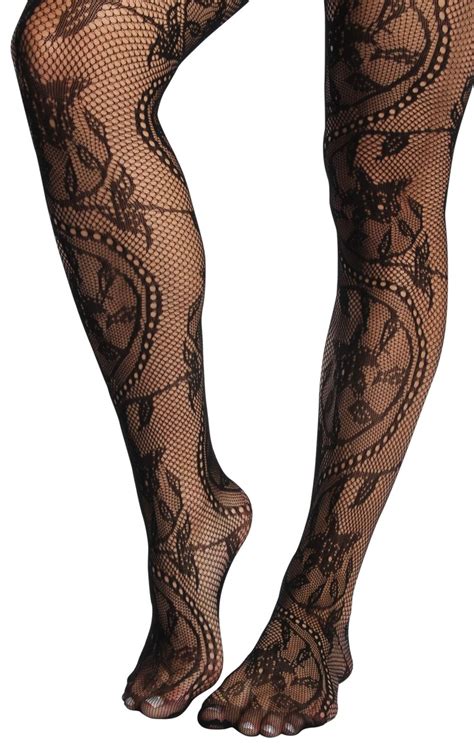 Stitched up lace floral decoration. fishnet #floral #lace pattern #tights $7.99