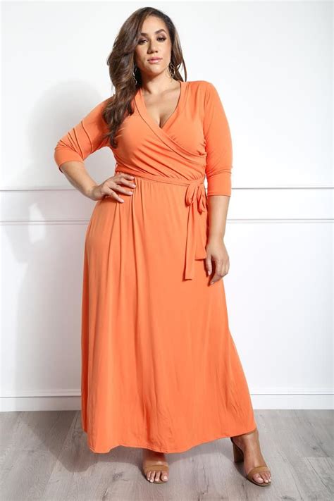 A Plus Size Maxi Dress With A Wrapped V Neckline And 34 Sleeves