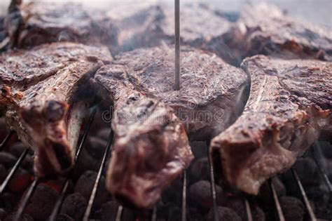 Big Beef Steaks On Bone Grilled Barbecue With Thermometer Stock Image