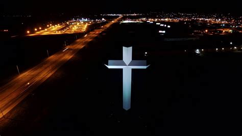 Very Cool Picture Of The Cross At Night With The Lights Of Effingham In