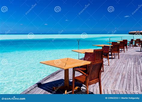 Tables And Chairs At Tropical Beach Restaurant Stock Photos Image