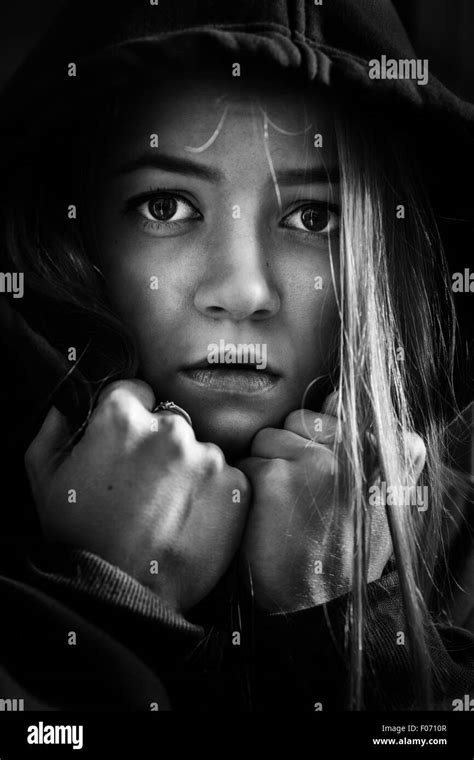 Dramatic Portrait Of Scared Girl In The Dark Stock Photo Alamy