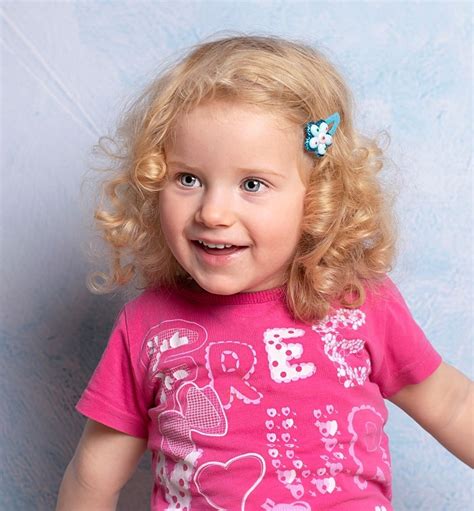 Little Girl With Wavy Blonde Hair