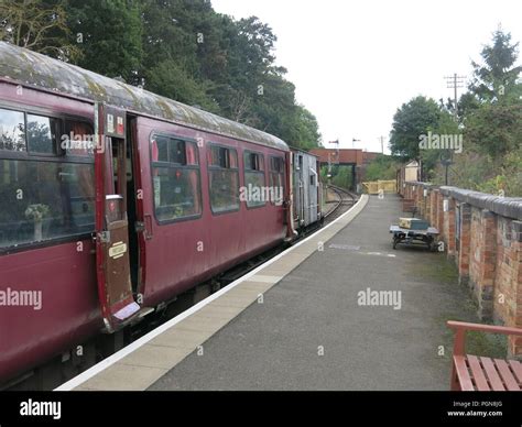 Train Carriages Alongside The Platform At The Northampton And Lamport