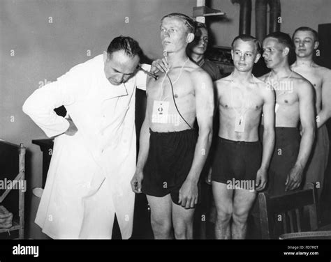 Examination With A Stethoscope During A Medical Exam Stock Photo