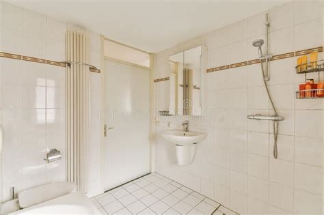 A Bathroom With A Shower Sink And A Toilet Stock Photo Image Of