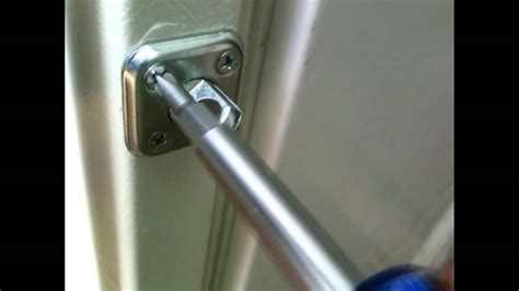 Now you can begin boring a hole in your door once your equipment is set. DIY fridge door lock w/ bonus alarm system - YouTube