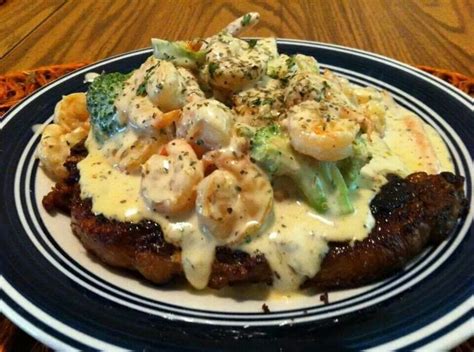 Cook, stirring constantly, until sauce thickens. Rib eye steak topped with broccoli and shrimp Alfredo ...