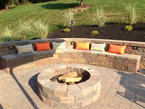 In this video i show and explain how i built my fire pit from retaining wall blocks with a galvanised round garden bed for the inner rim. Retaining Wall Fire Pit - Fire Pit Ideas