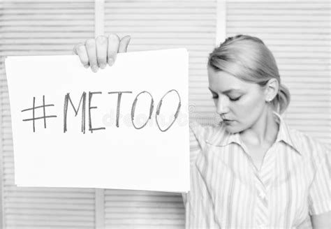 movement against sexual harassment woman sad face hold poster hashtag me too stock image