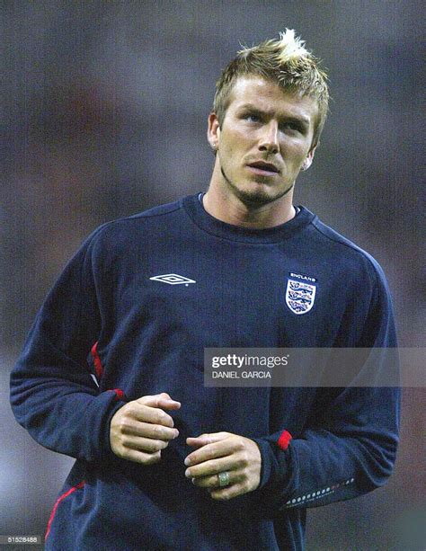 English Captain And Midfielder David Beckham Runs Before The Second