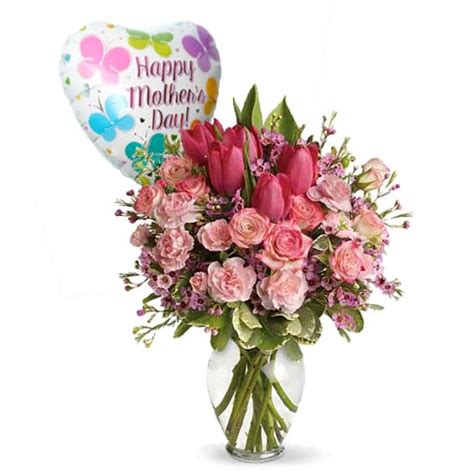 Whether you have to express your sympathy, apology, appreciation or gratitude towards someone special, doing it with blossoms is the best choice. Mother's Pink Tulip Bouquet And Balloon at Send Flowers
