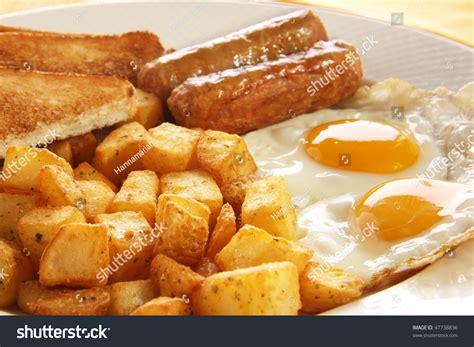 Breakfast Eggs Sausages Toast Hash Browns Stock Photo 47738836