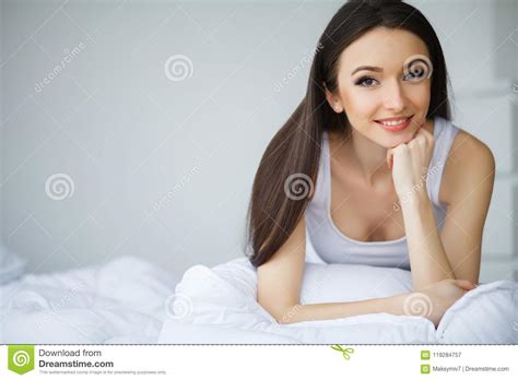 Young Beautiful Woman Lying On Bed Stock Image Image Of Female Home 119284757