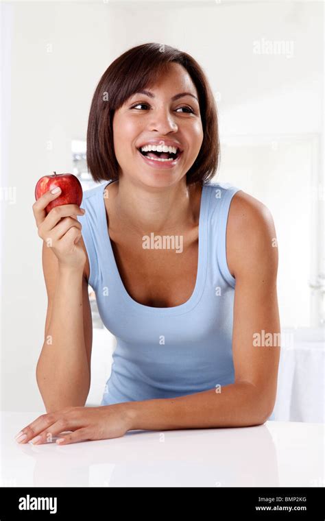 Woman Holding Red Apple Stock Photo Alamy