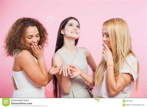 Three Beautiful Women Admire Friend`s Engagement Ring Stock Image