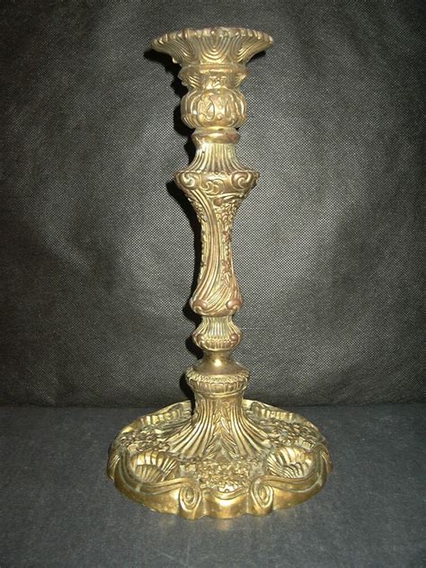 Cast iron is about 3.5% iron and is poured into molds. Antique brass candlestick very heavy tall gorgeous detail ...
