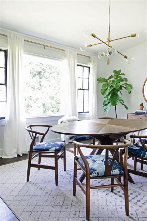 Our dining room is basically a walkway from our front room to our sun room, so we wanted to make sure it wasn't too big that it would be in the way, but would also fit up to eight people. West Elm Mobile Chandelier - Copy Cat Chic