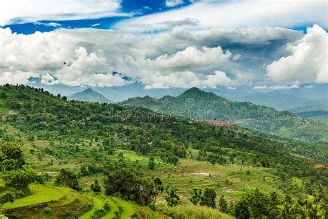 Aerial View Of Beautiful Nepali Village Surrounded By The Green Stock