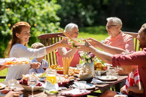 Located at 2443 highway 7 & 41 excelsior, mn 55331 (behind speedway at the intersection of highway 7 & 41). Happy Family Having Dinner Or Summer Garden Party Stock ...