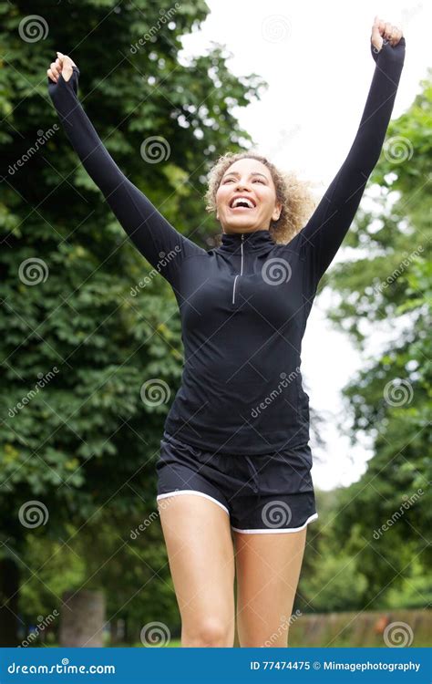 Runner With Hands Raised Stock Image Image Of People 77474475