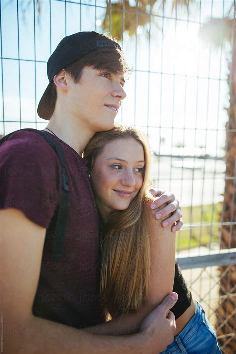 Portrait Of A Teen Couple Smiling In Summer By Stocksy Contributor