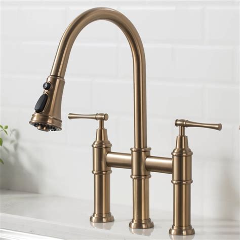 Check out our brushed gold bronze selection for the very best in unique or custom, handmade pieces from our shops. Kraus Allyn Transitional Bridge Kitchen Faucet with Pull ...