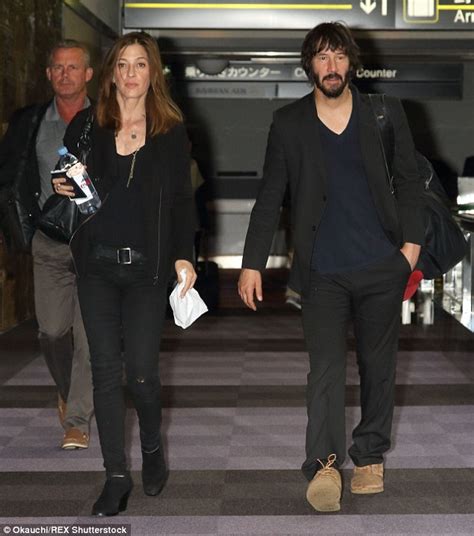 Keanu Reeves Beams A Smile Beside Mystery Brunette At