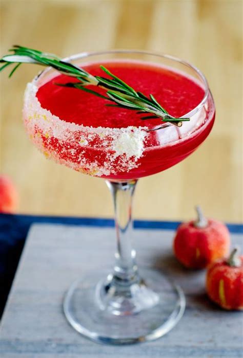 A Red Drink With Cranberry And Lime Juice Is The Perfect Cocktail For