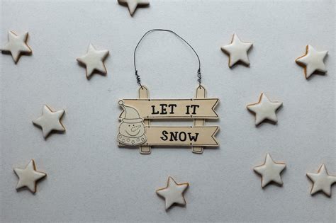 Decorative Signboard With Let It Snow Title On Christmas Day · Free