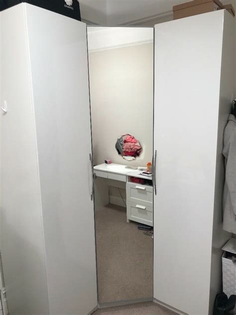 And they are cheaper too. IKEA Pax Corner Wardrobe Mirror & White doors | in ...