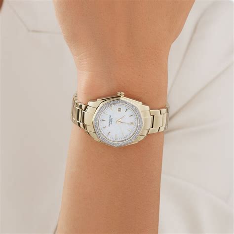 Ladies Mother Of Pearl Watch With 025 Carat Tw Of Diamonds In Gold