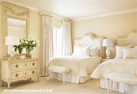 White Guest Bedroom With Twin Beds And White Bedding Via Sarahsarna