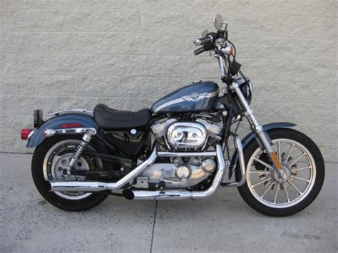 She has several chrome accessories including the engine guard, oil tank. 1988 Harley-Davidson XLH Sportster 883 Hugger - Moto ...