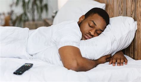 Black Man Sleeping Holding Money Hugging Cash Lying In Bed Stock Photo Image Of Adult Male