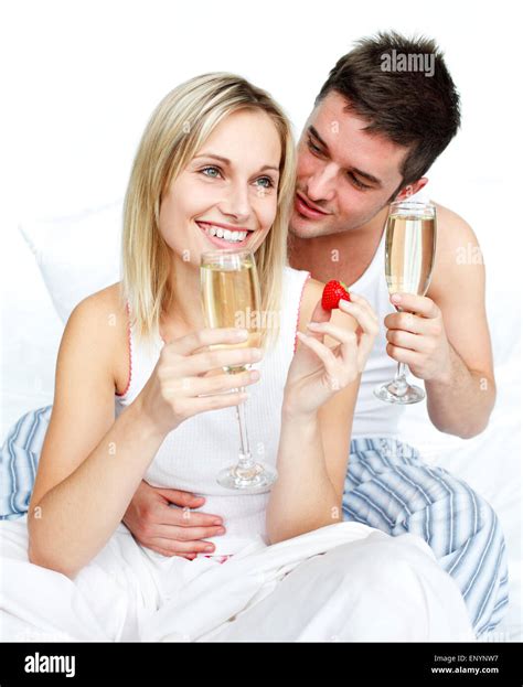 Young Lovers Eating Strawberries And Drinking Champagne Stock Photo Alamy
