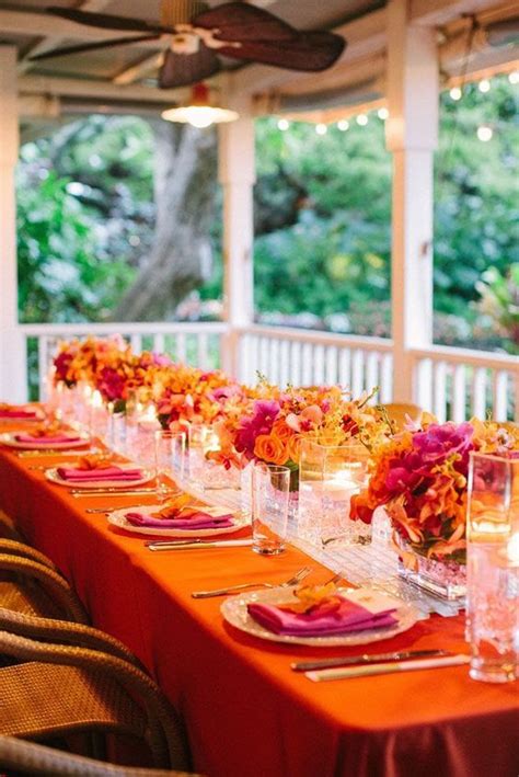 love the bright oranges and purples weddingreception orange and pink wedding orange wedding