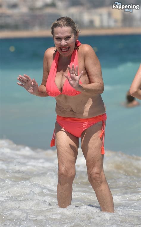 Tina Malone Flashes Her Areola As She Enjoys A Day On The Beach In