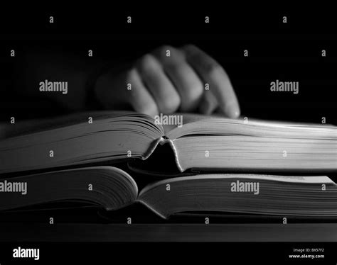 Studying From Thick Books Stock Photo Alamy