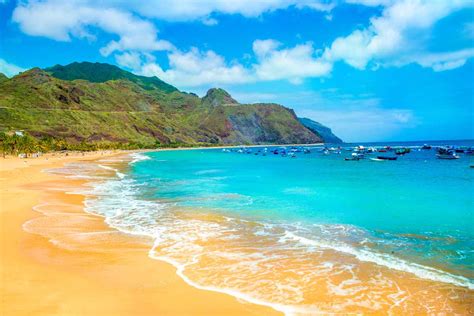 British and german tourists come in their tens of thousands every year to visit its spectacular beaches and lively nightlife. Tenerife - Insula Primaverii Vesnice