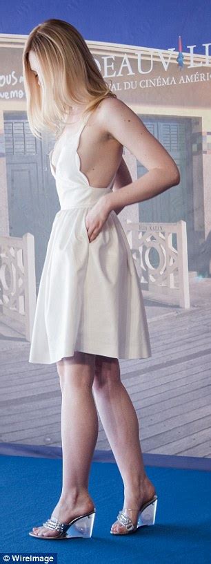 Elle Fanning Exudes Elegance In Flirty White Mini Dress As She Attends