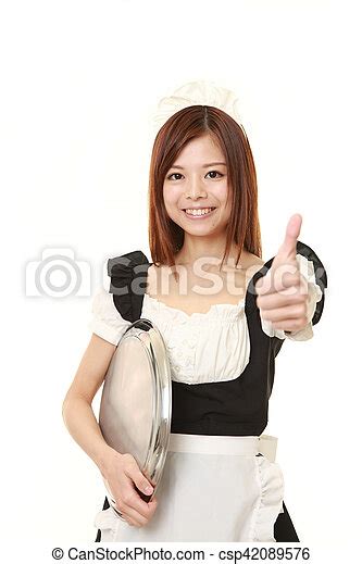 Young Japanese Woman Wearing French Maid Costume With Thumbs Up Gesture