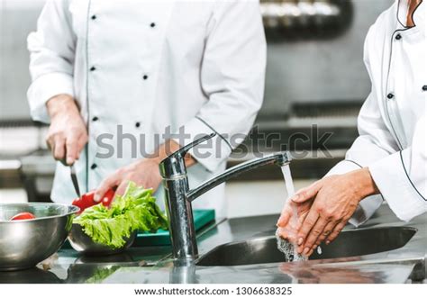 Cropped View Female Chef Washing Hands Stock Photo Edit Now 1306638325