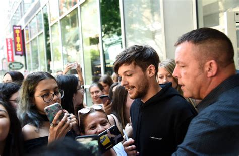 Louis Tomlinson Visits Music Choice Photos And Images Getty Images
