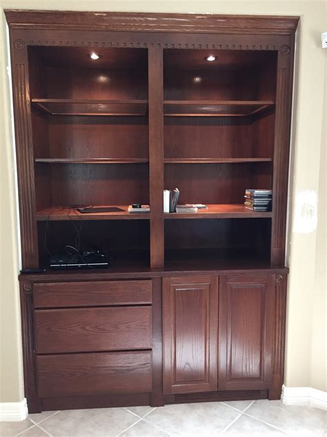 We built a 2 x 4 box for a kicker plate along the bottom and attached it to the pantry carcass with wood screws. Jaimes Custom Cabinets | Custom Built-Ins