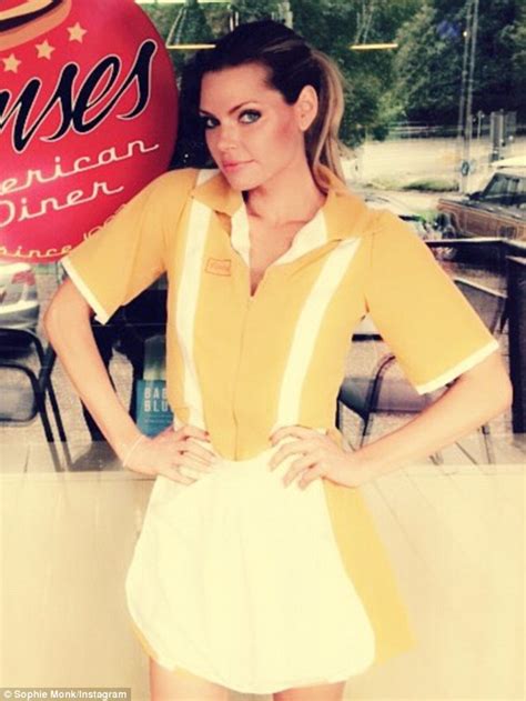 Sophie Monk In Canary Yellow Waitress Costume As She Films Blood Feast